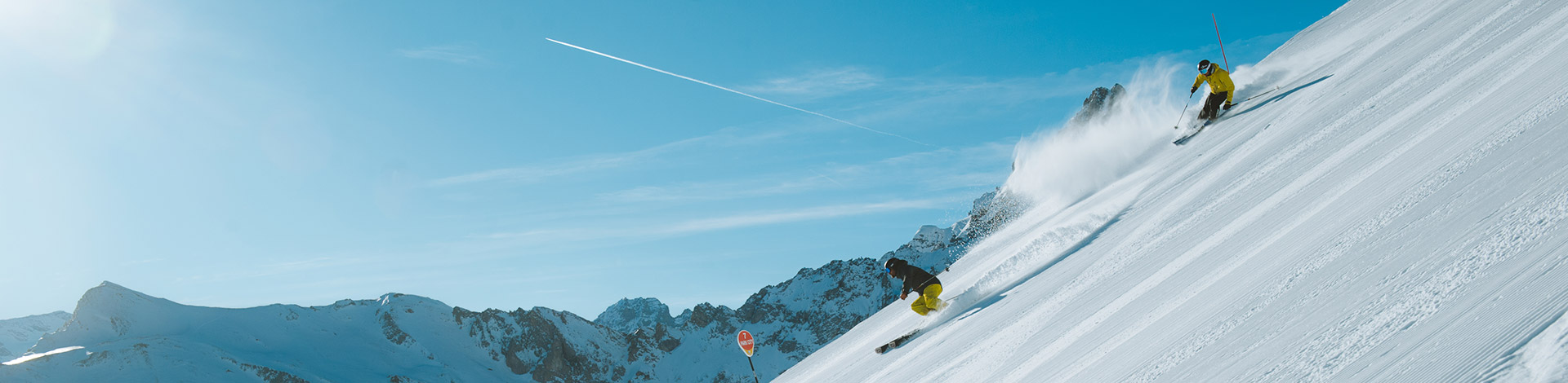 Alpine skiing in Les 3 Vallées on the Park city piste of Courchevel.